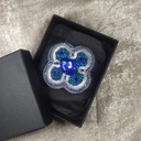 Broche arabesque bleue