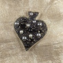 Broche pique noire