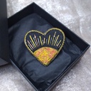 Broche coeur levé de soleil